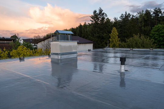 bitumen.jpg Rooftop HVAC units at dusk